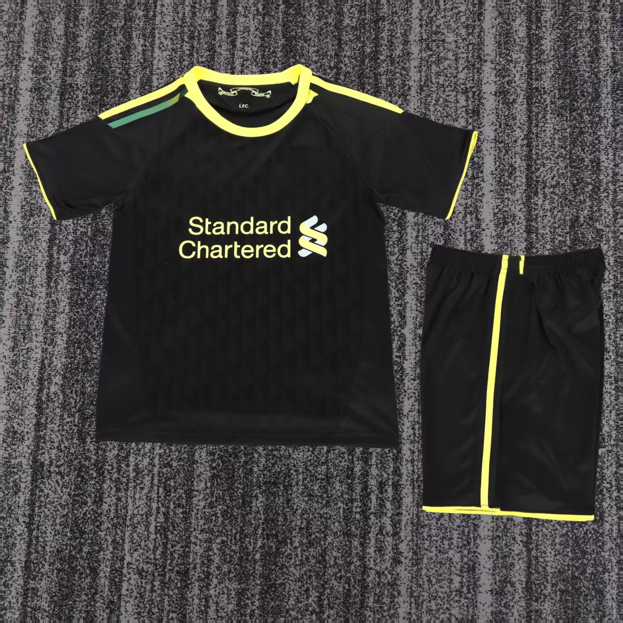 Chelsea wore black and yellow jerseys away 10-11