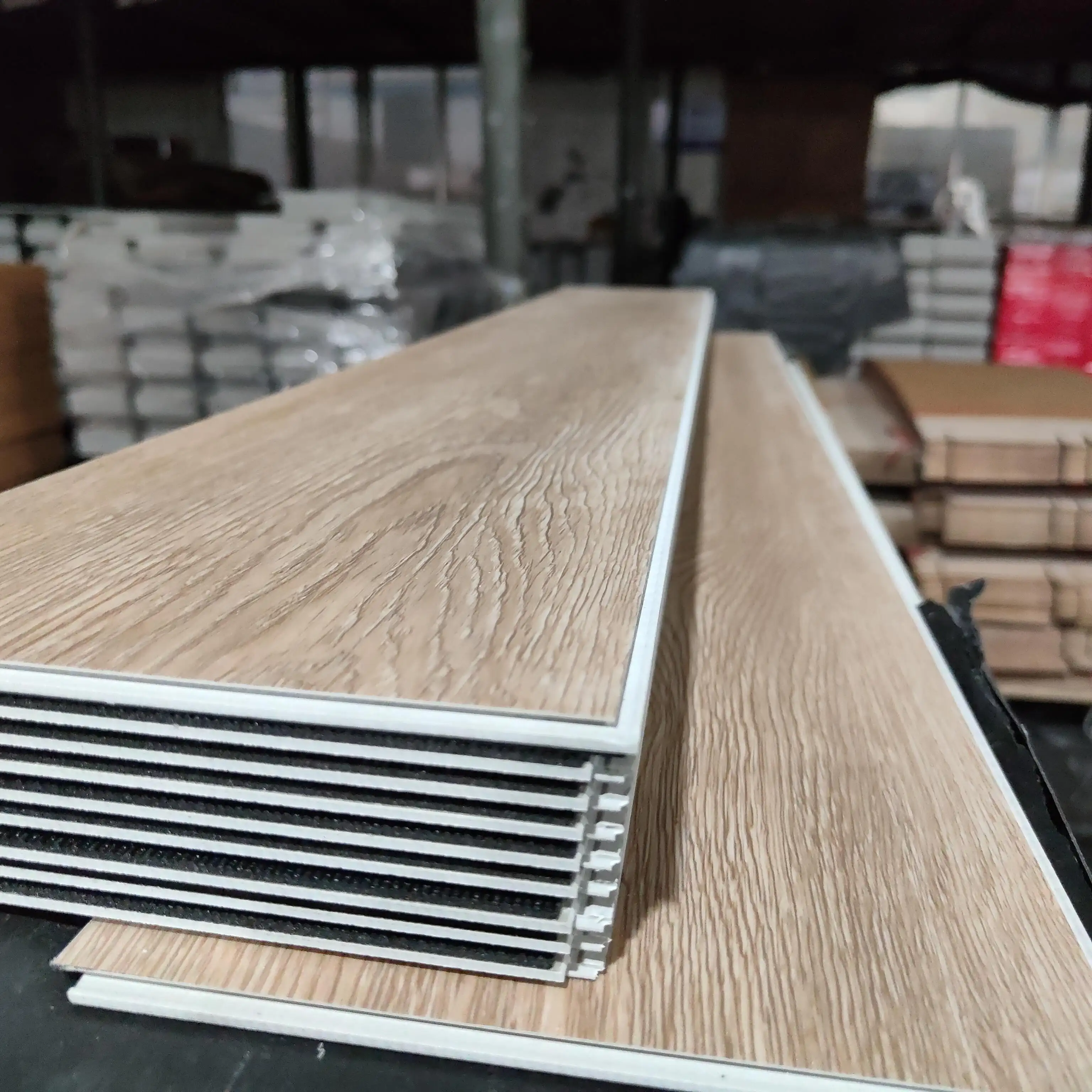 Suelo de tablones de vinilo Spc de alta calidad, impermeable, grano de madera, núcleo rígido, suelo de plástico, suelo Spc con Ixpe