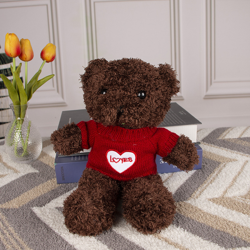 Burgundy sweater black bear