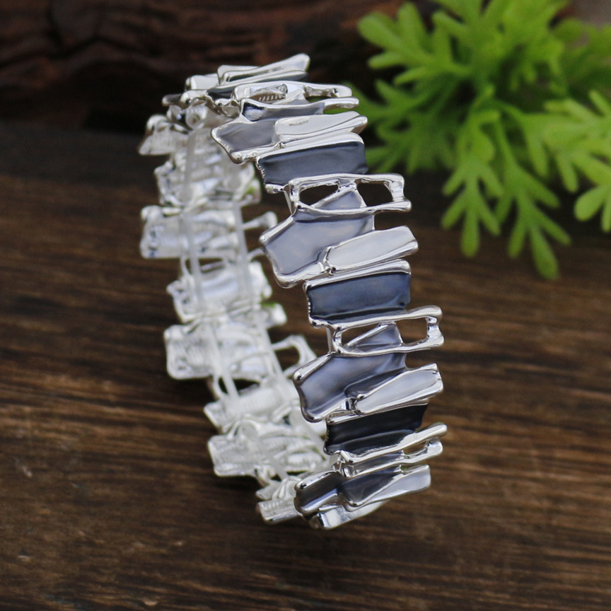 Bracelet irrégulier noir et gris-argent