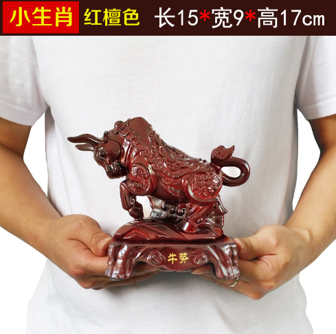 Pequeños adornos de vaca del zodiaco