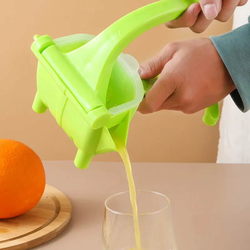 Einfache manuelle Orangensaft presse Kunststoff Küche liefert Gadget Entsafter manuelle Hand presse