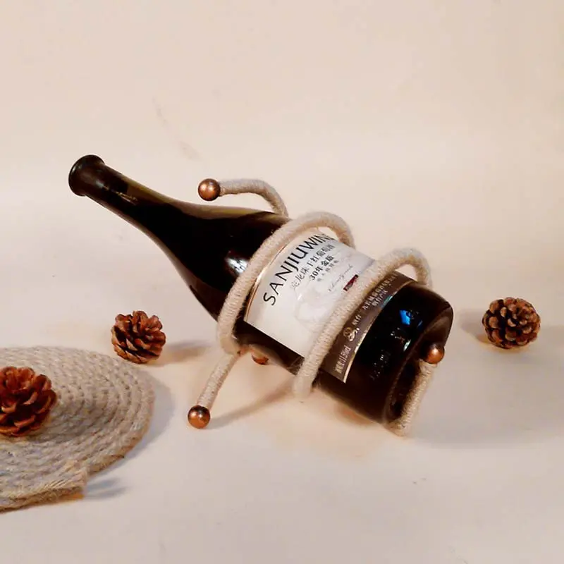 Botellero de alambre artístico de hierro, estante para vino con Material de cuerda de cáñamo