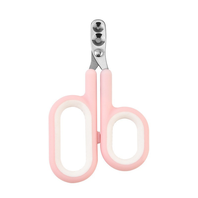 Ciseaux roses en forme de D