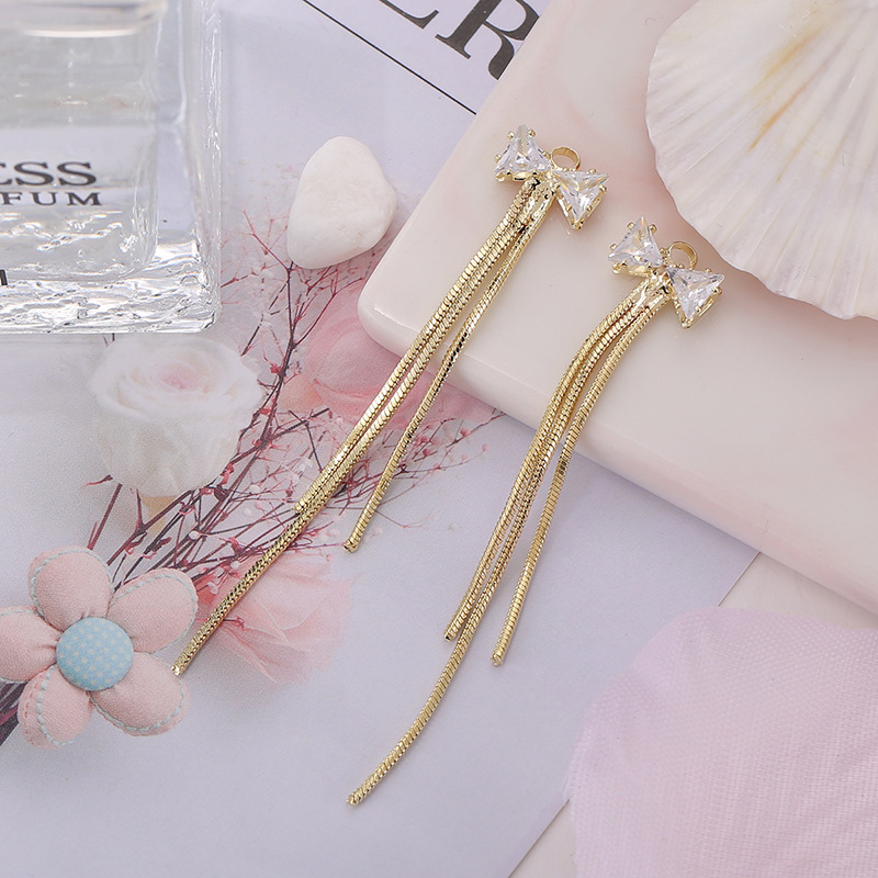 2 zircon bows 3 snake chains
