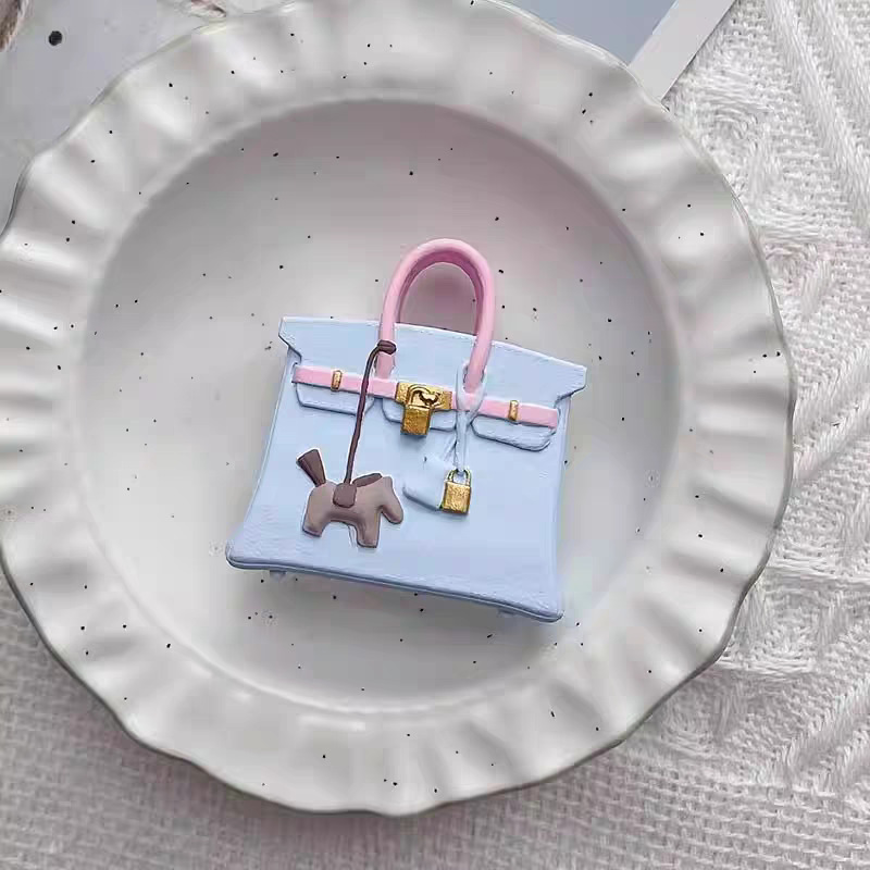 Bolso pony rosa y azul