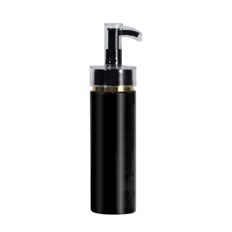 Black bottle with gold rim pump