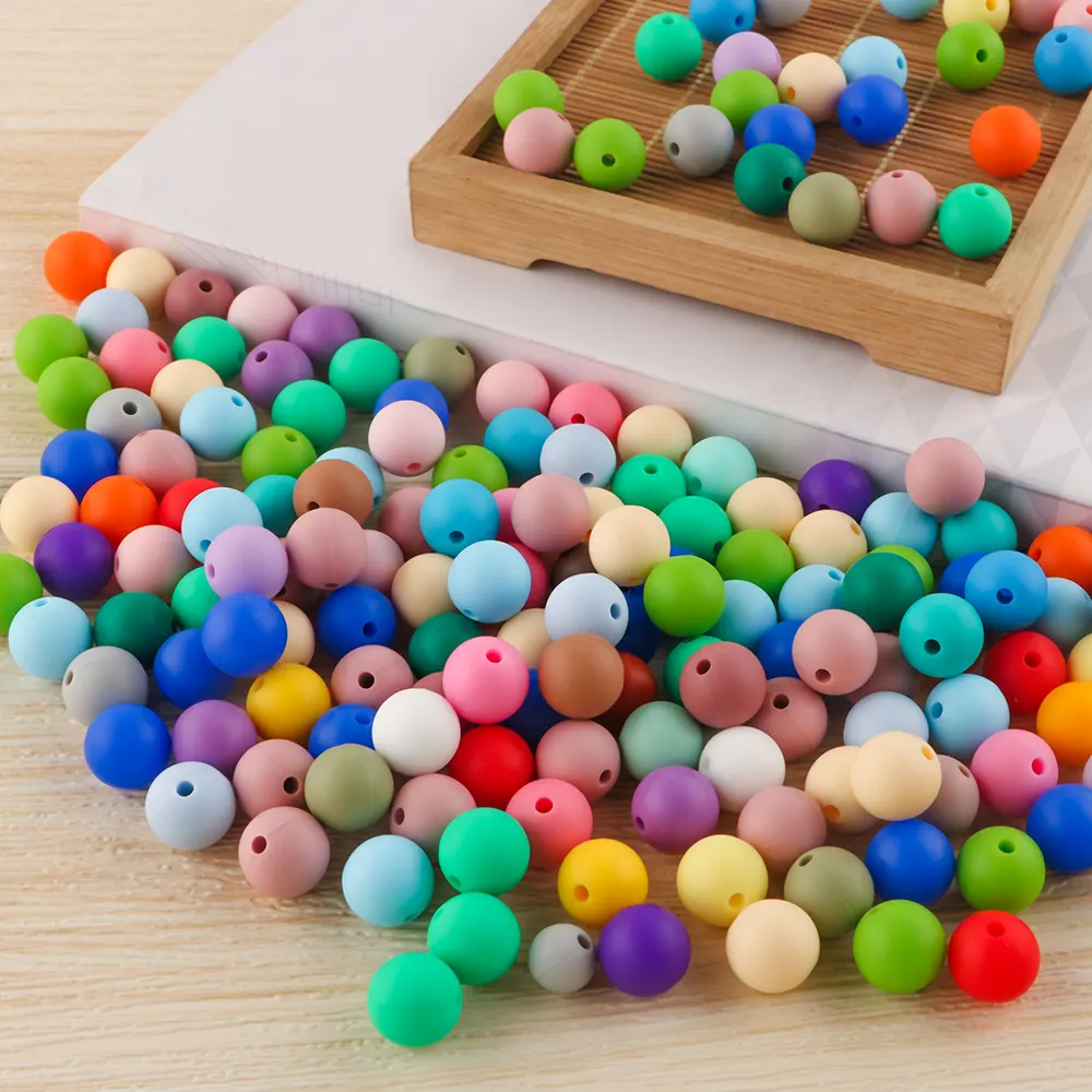 Kovict vente en gros 12mm perles de dentition en silicone caractéristiques de sécurité écologiques bricolage perles stylo faisant des jouets bébé collier Bracelet