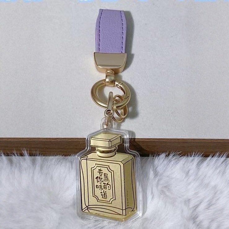 Flacon de parfum (contenant 20mg d'or - corde violette)