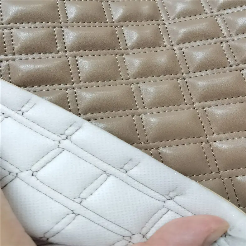 Di fabbrica su misura ricamato tessuto non tessuto del grano del litchi pelle artificiale per il tappetino auto e seggiolino auto tessuto di copertura