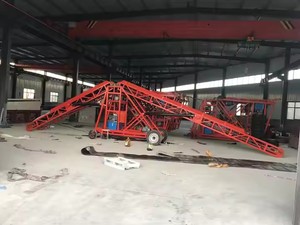Transportador de cargador móvil de uso múltiple para apilar, cargar y descargar a varias alturas