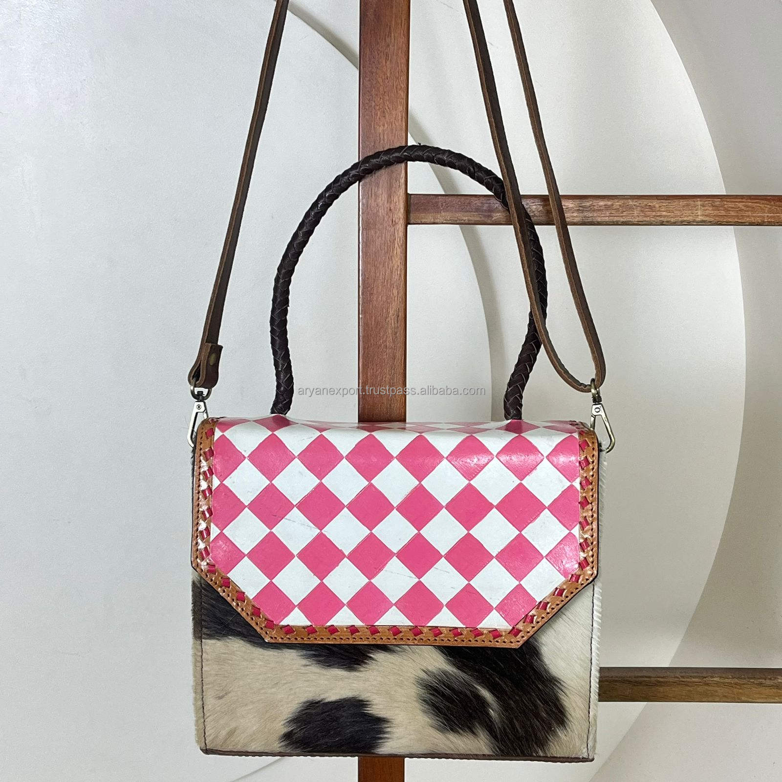 Marron à carreaux roses