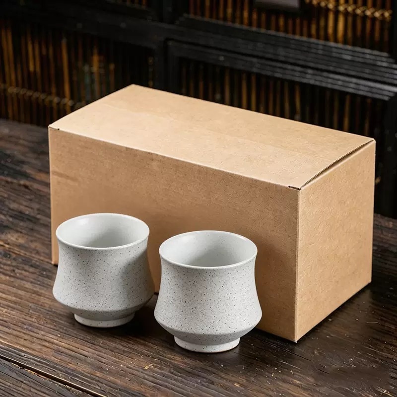 E - 2 tazas de mármol blanco