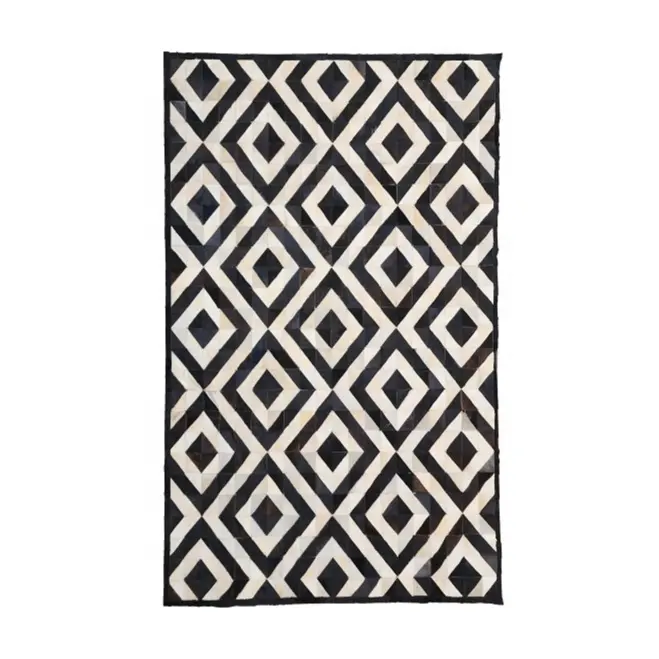 Vente en gros de tapis en cuir de vachette avec patchwork de fourrure de vache tapis doux et soyeux pour chambre à coucher tapis à poils longs TIA personnalisé fabriqué à la main