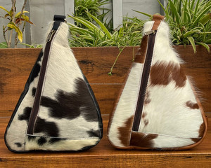 סיטונאי 2025 חדש cowhide couhide תיקי חזה לגברים ולנשים באיכות גבוהה קיבולת גדולה