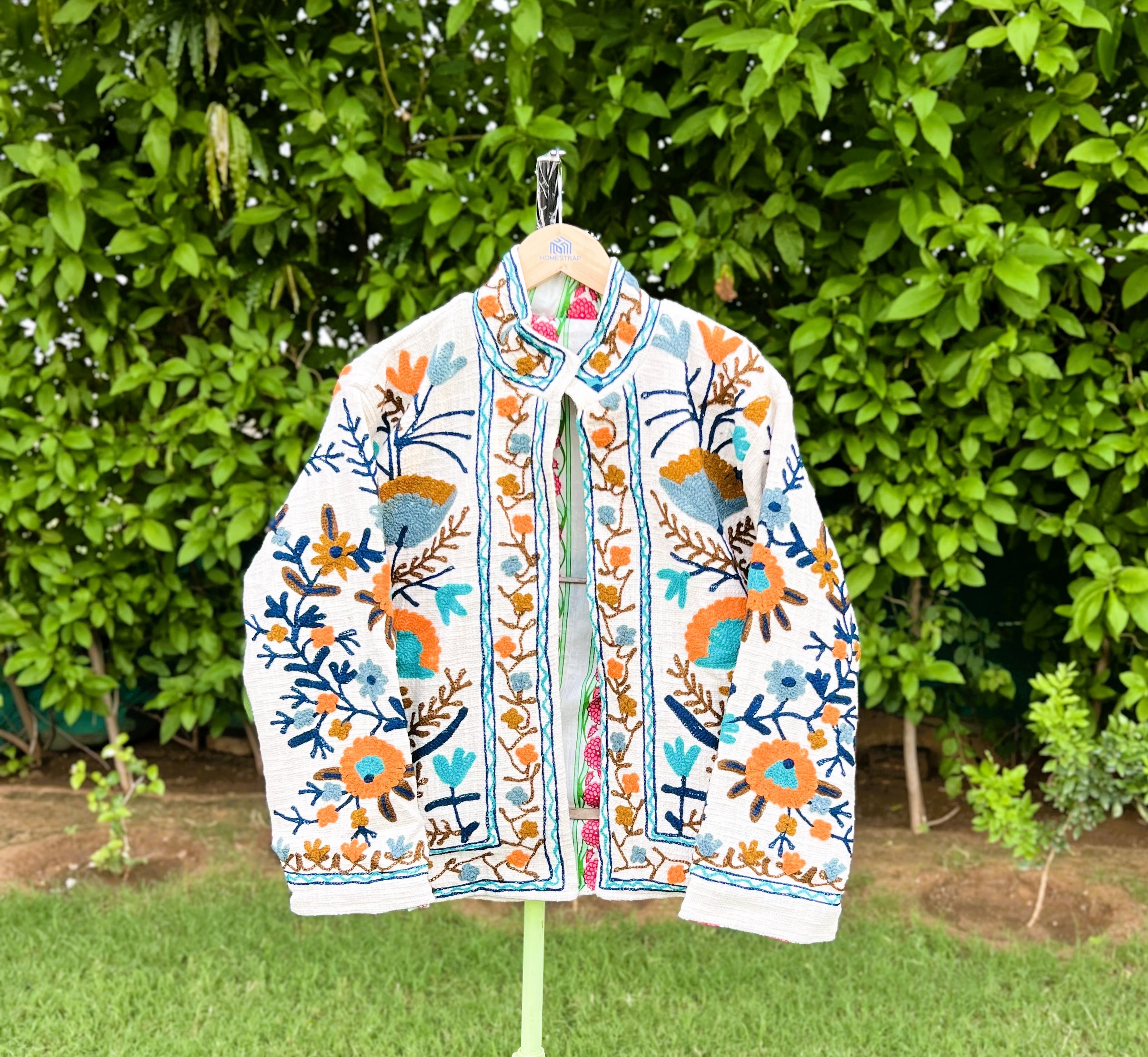 White Base with Blue, Orange, Mustard & Brown Embroidery