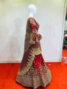 Exclusive Luxurious Wedding Ensemble Net <strong>Short</strong> Trail Cut Lehenga All-Over Jarkan Stone Work Heavy Flair Dressed Elegant Fabric - Product Image 4