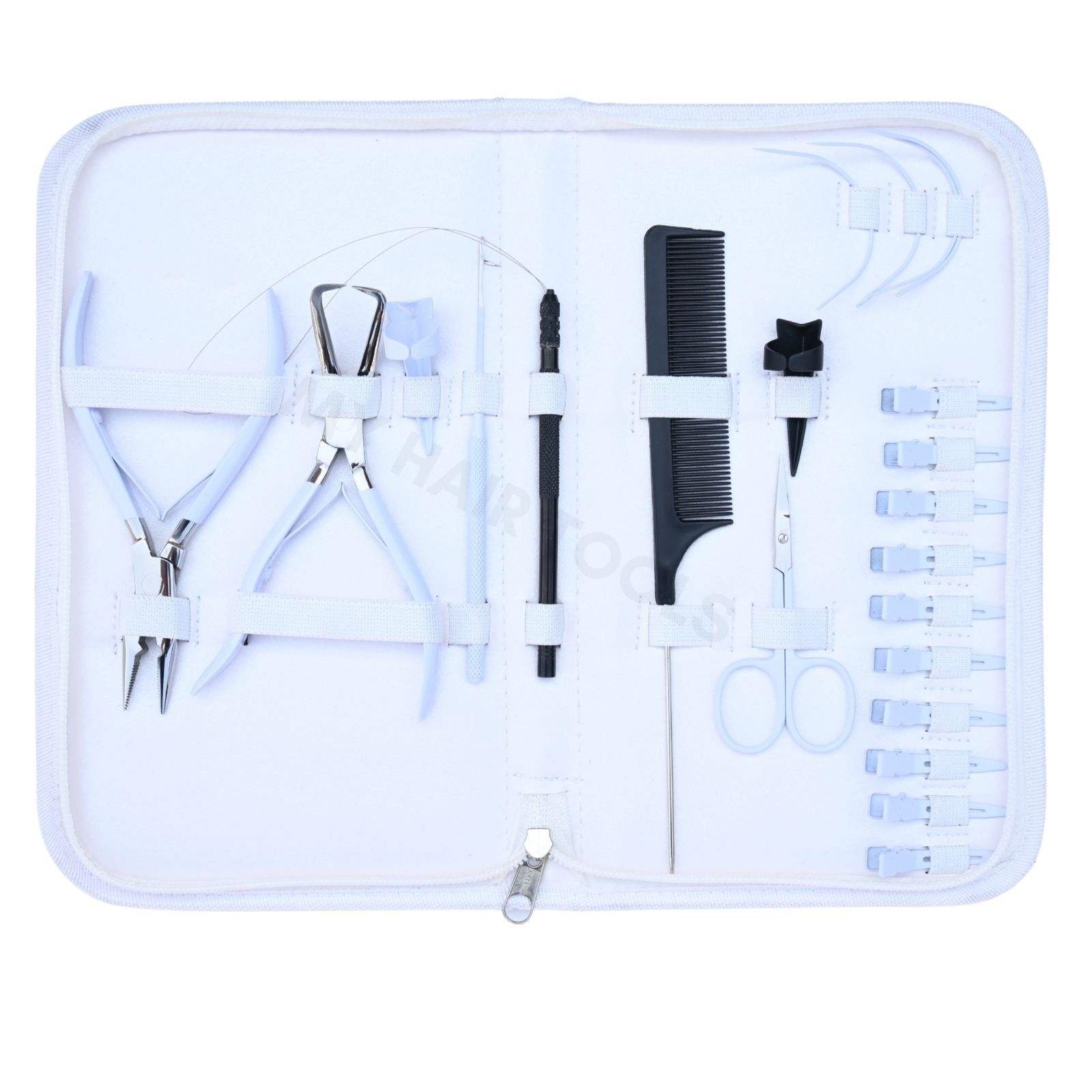 Outils pour extensions de cheveux noirs dans une trousse blanche