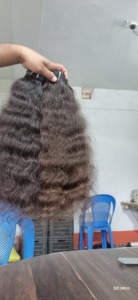 南インドレミーシングルウェイビーヘアエクステンション生テンプルバージンカーリーヘアプレミアム品質シングルドローウェーブカールスタイル
