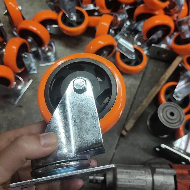Roulettes de type pivotant en PVC, à usage moyen, 4 poulie avec frein pour chariot, Orange gingembre