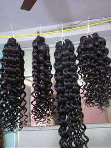 カーリーヒューマンナチュラルヘアエクステンション工場から卸売価格で入手可能非常に厚く健康的なボトム