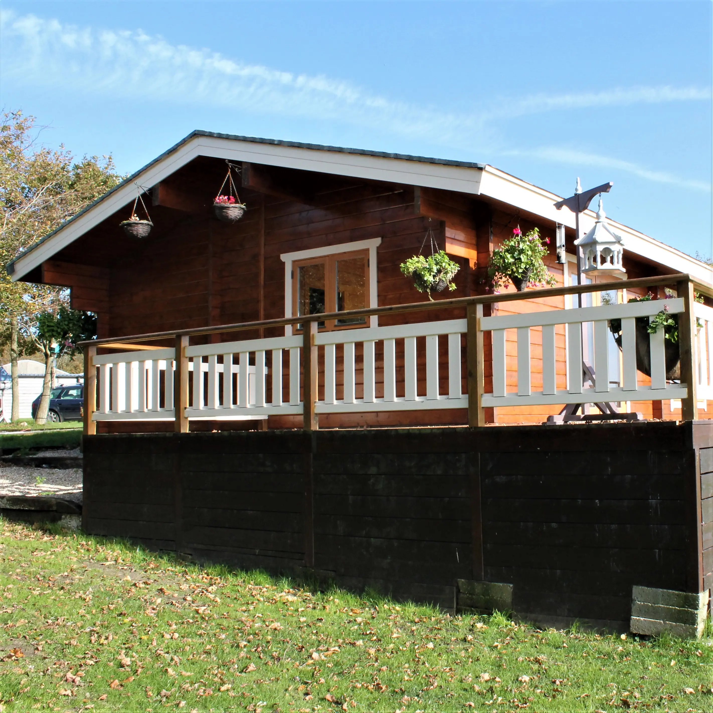 prefab cheap log cabin design kit UK caravan act specification mobile home energy saving green residential twin unit