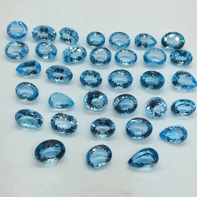 Véhicule en topaze bleue naturelle, qualité supérieure, 8 — 20 cavités, perles ovales, coussins d'octogone, pour vente en gros au prix d'usine