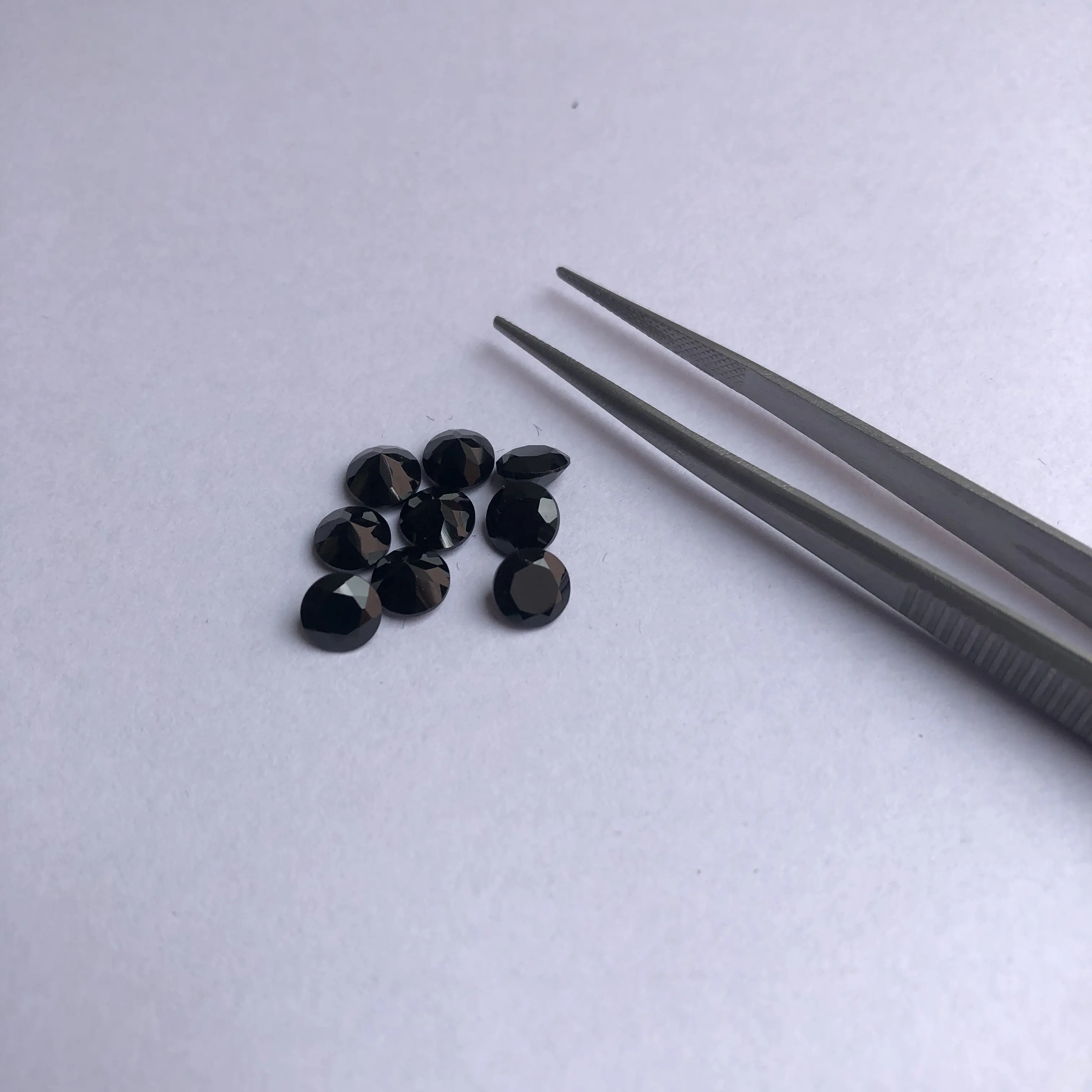 2.25mm doğal siyah oniks Faceted yuvarlak kesim kalibre gevşek taş toptan fabrika fiyat yarı değerli takı yapımı için