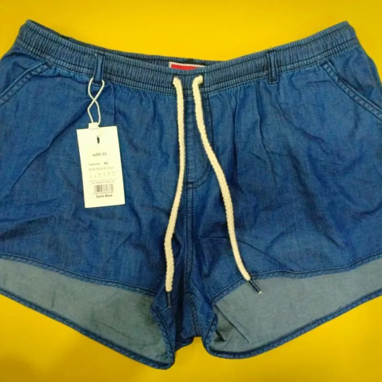 Pantalones cortos de estilo de Dosting para mujer, pantalones vaqueros elásticos de cintura, pantalones vaqueros azules, etiquetas de la marca de banda, lote de Stock