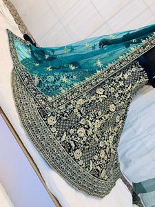 นักออกแบบชาวอินเดียล่าสุดสีแดงเจ้าสาว Lehenga Choli Unstich Design แต่งงาน Lahnga Choli ผู้หญิง Lengha ผู้ค้าส่งสุราษฎร์อินเดีย - Product Image 2