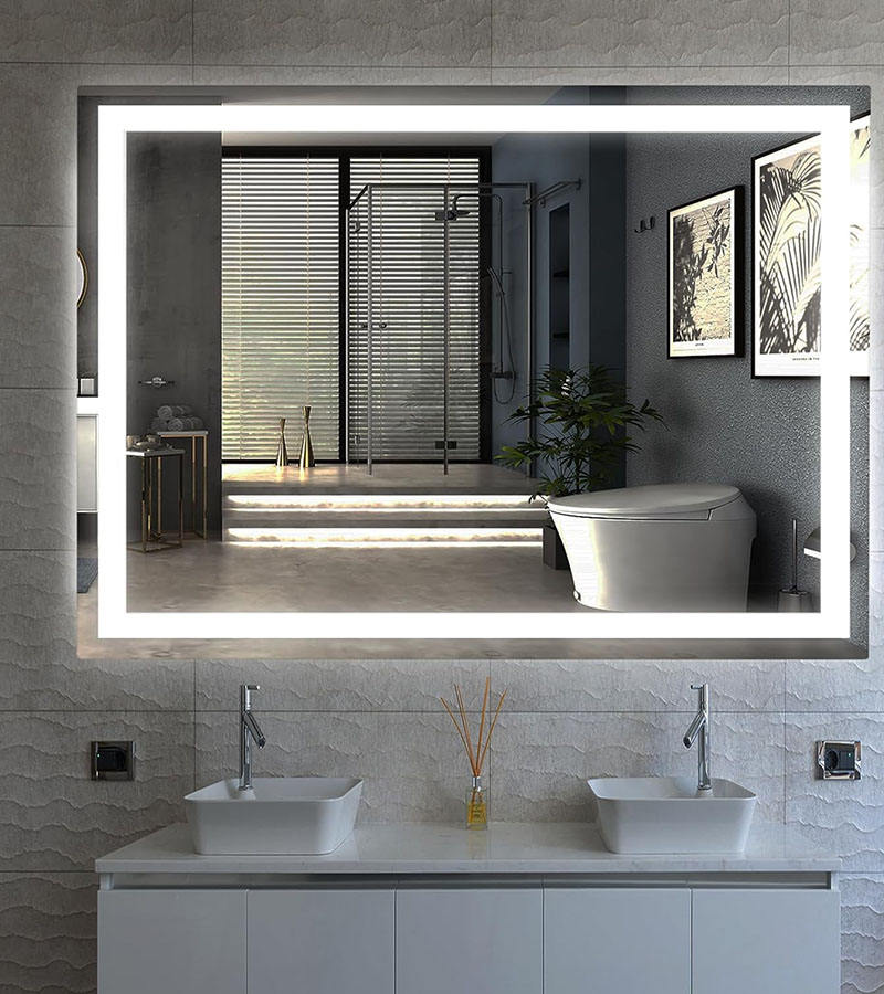 Hotel bathroom mirror with uniform LED illumination for guest comfort