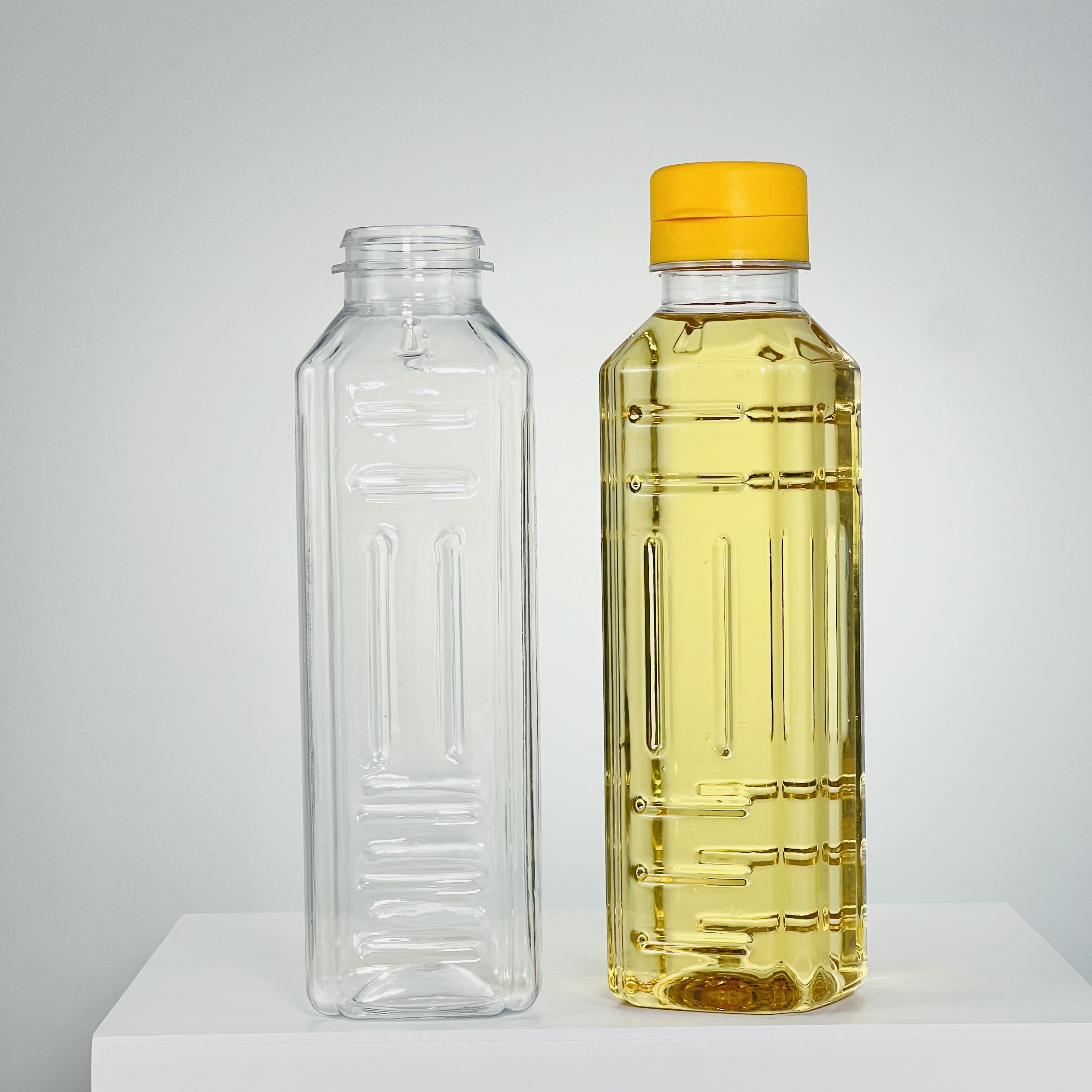 https://s.alicdn.com/%40sc04/kf/H2bff46d04a2242789029ecd50b90dc80b/Hot-Sale-300mL-Square-Plastic-Oil-Bottles-Food-Grade-for-Olive-Oil-Coconut-Oil-Milk-Candy-Sugar-for-Storage.jpg