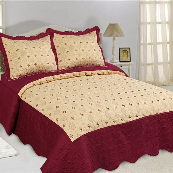 Burgundy and cream embroidered bedspread