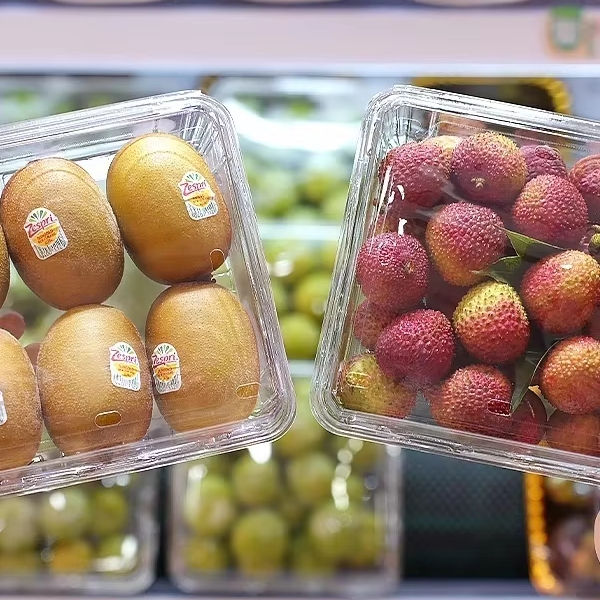 https://s.alicdn.com/%40sc04/kf/H4a6ed7bb7c4c4469aadcfbb7850cf3a3T/Disposable-Transparent-Fruit-Packaging-Box-400P-Square-Kiwi-Litchi-Jackfruit-Box-Recycled-Plastic-with-Stamping-Printing.jpg