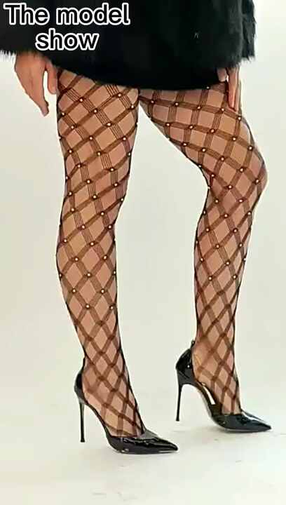 sexy fishnet heels Sexy woman legs in high heels bondage and fishnet - Stock Photo [60207769] main image 0