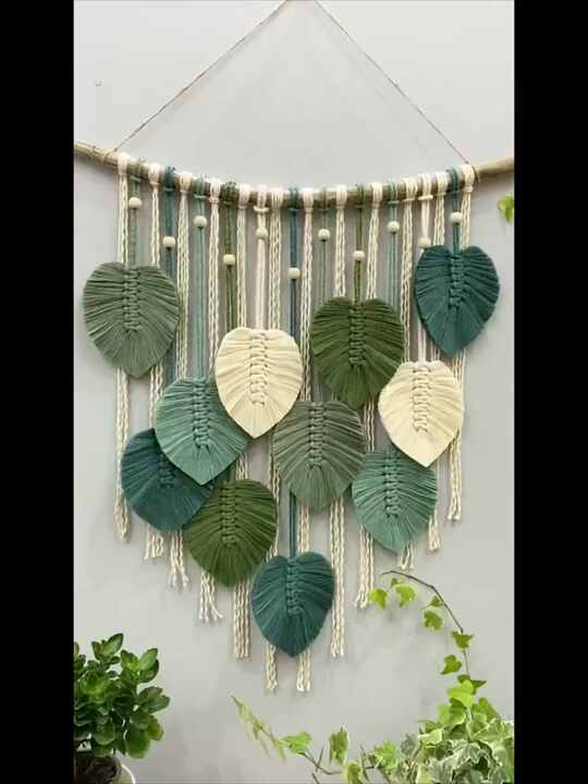 Image showcasing Eco-friendly Wall Decorations - Boho Leaf Feather Hangings