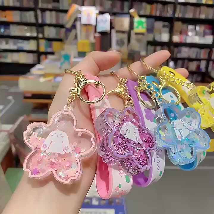 クリエイティブな浮遊桜ウサギキーホルダー、液体オイルウサギが動く