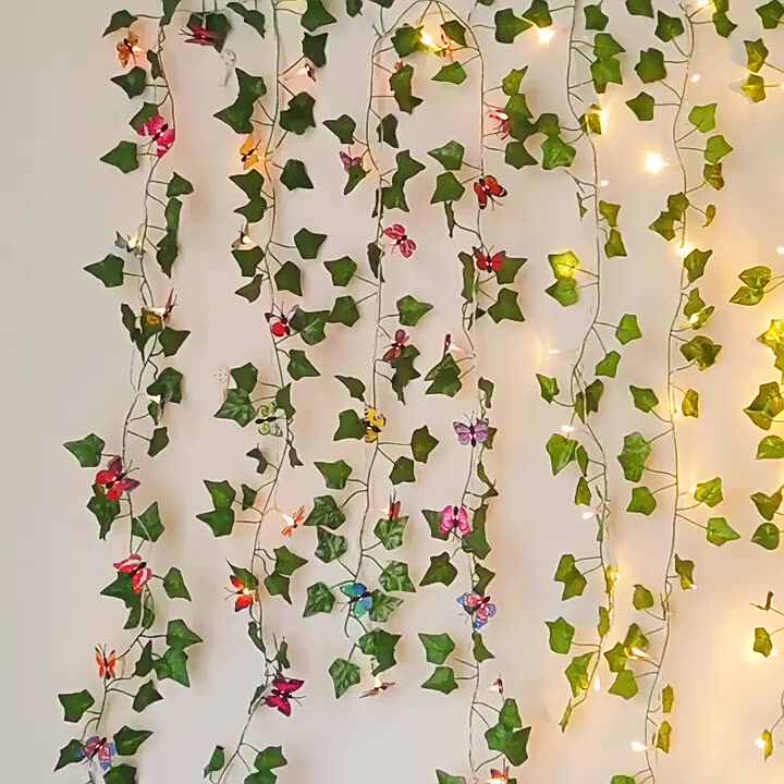 Knstliche Efeu-Blatt-Lichterkette mit Schmetterlings-Lilien-Blumen,  batteriebetrieben, fr Weihnachten und St. Patrick's Day
