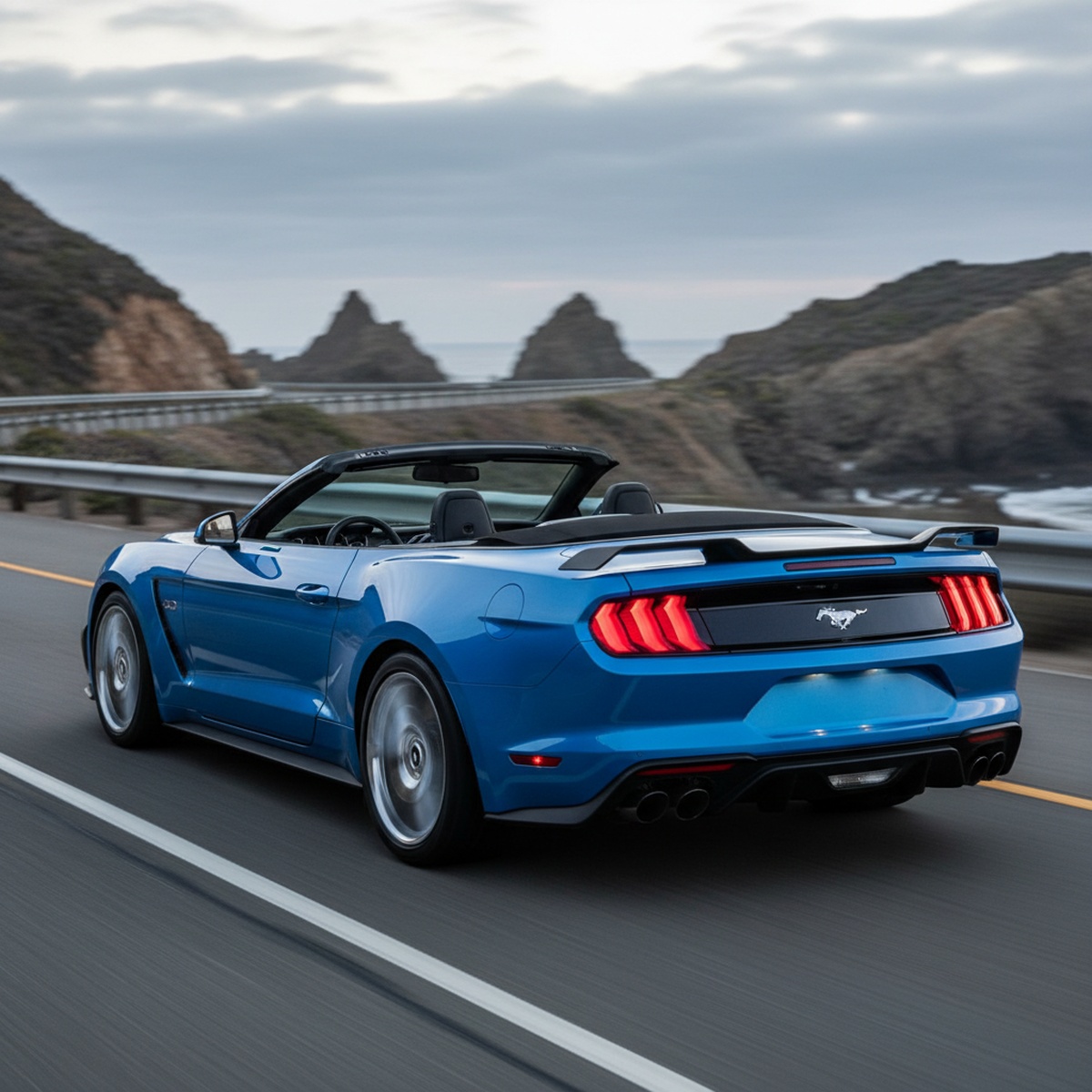 Vibrant blue convertible sports car on a scenic coastal highway with top down.