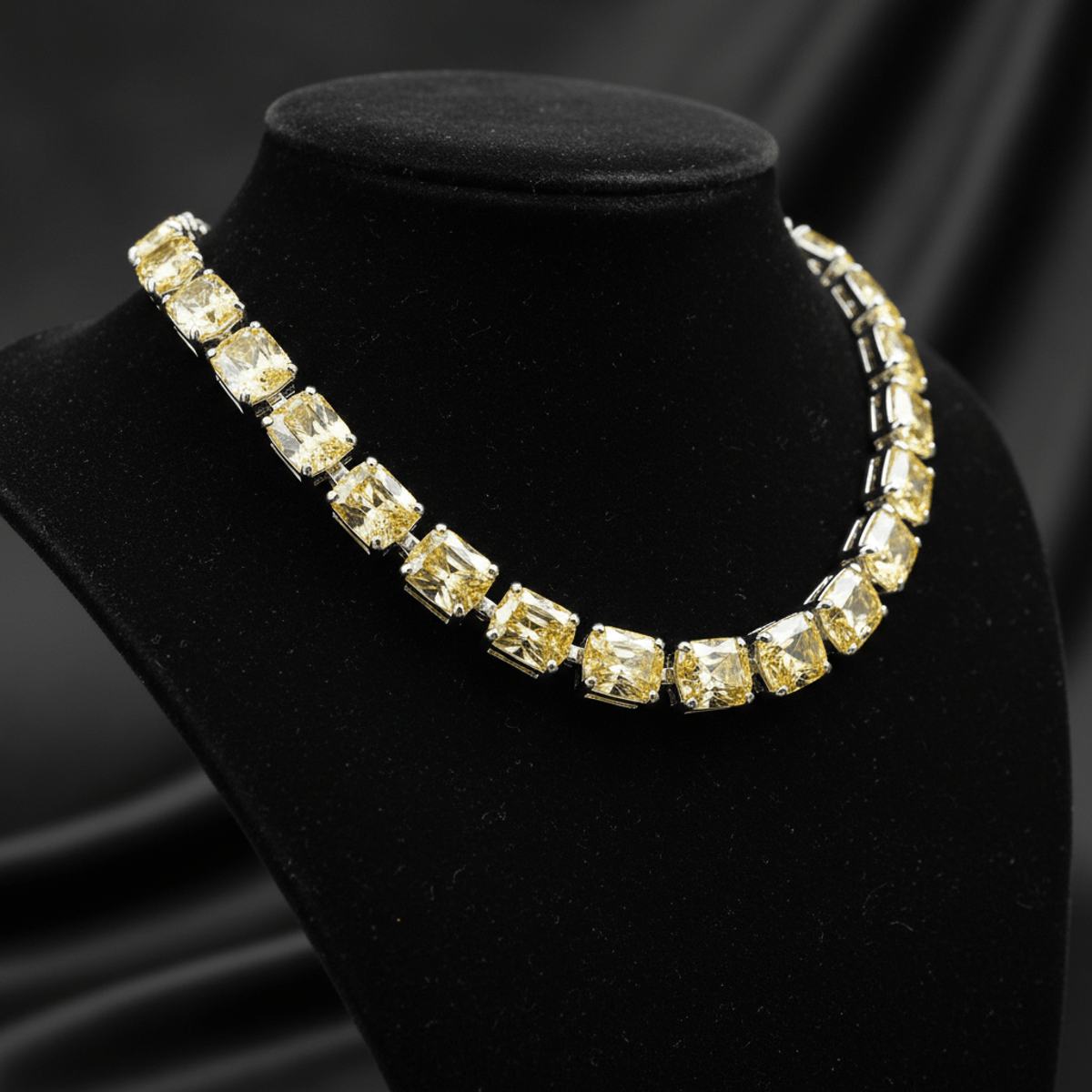 Luxurious canary yellow moissanite diamond chain set in platinum links on velvet.