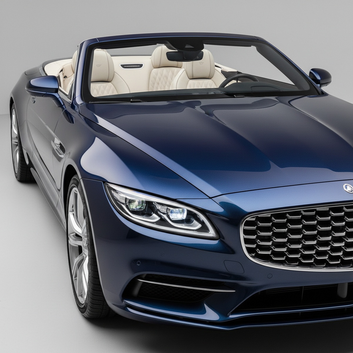 Luxurious midnight blue convertible with elegant proportions and chrome accents.