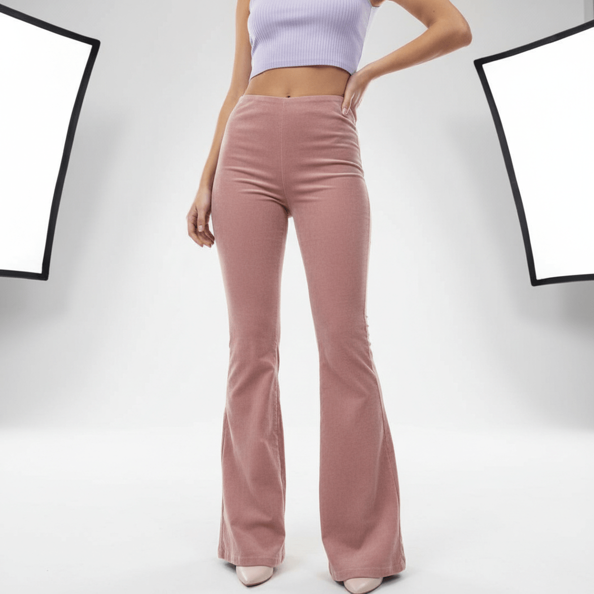 Dusty rose corduroy pants with a gentle flare, paired with a pastel crop top.