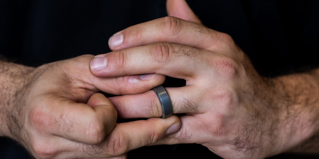 Man’s hands with wedding ring