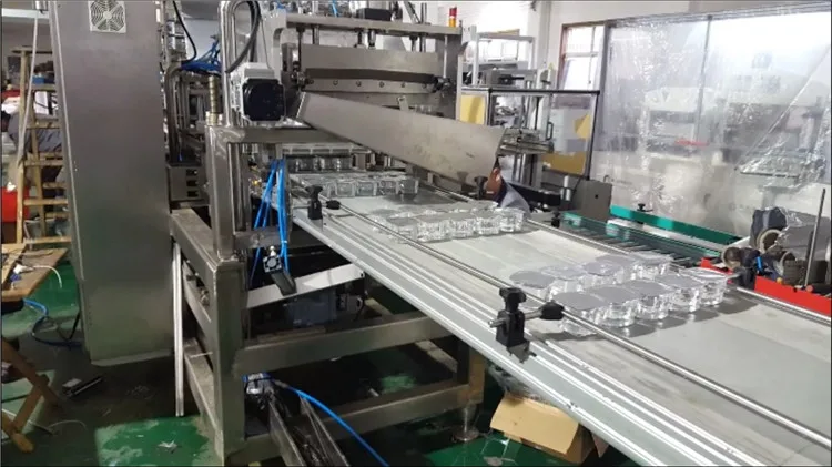 Automatic plastic liquid cup thermoforming fill and seal machine horizontal