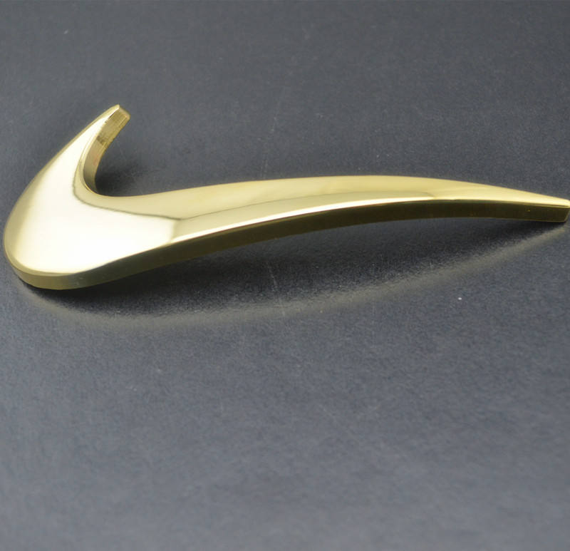 silver nike swoosh pin