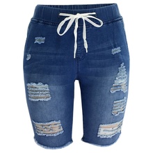 knee length ripped denim shorts