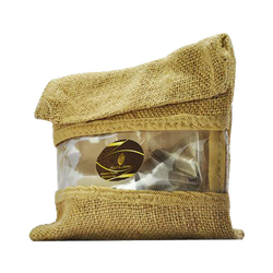 Ghassoul powder with plants, Moroccan clay lava from Morocco Atlas mountains for body and hair