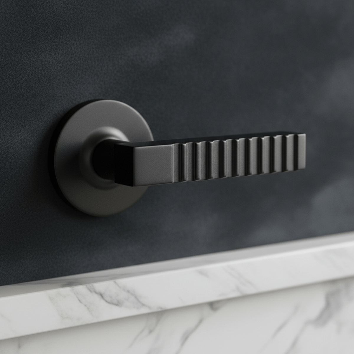 Close-up of a luxurious matte black Art Deco door knob with fluted lever.