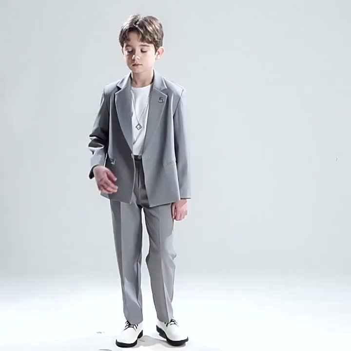 Ring Bearer at Wedding Suits British Host With Corsage High