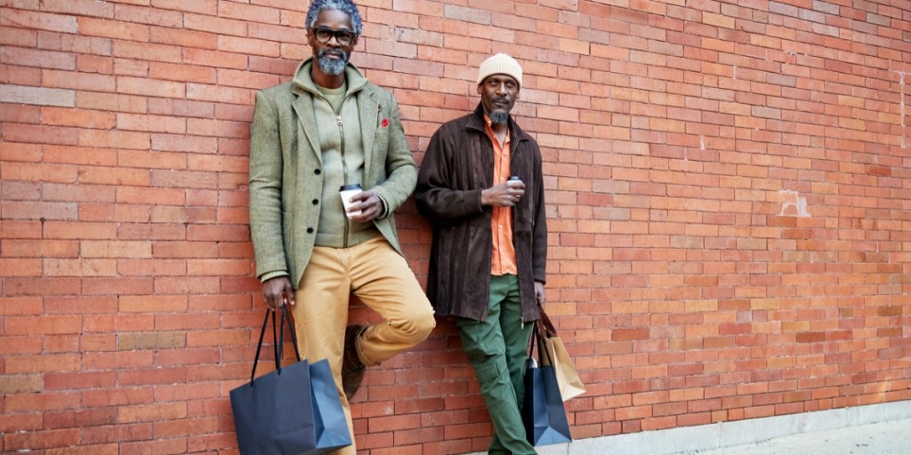 Two men in their 50s posing for the camera